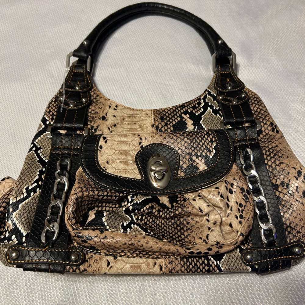Stylish Black and Tan Wilson's purse NWOT